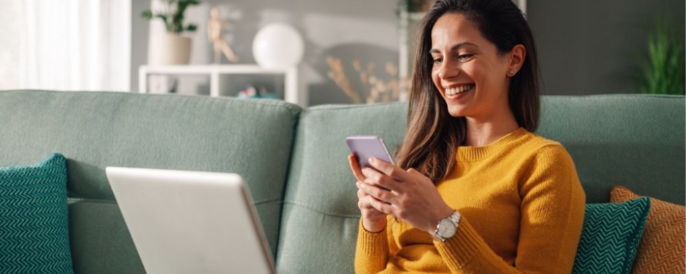 woman-on-phone-at-laptop-1000x400.jpg